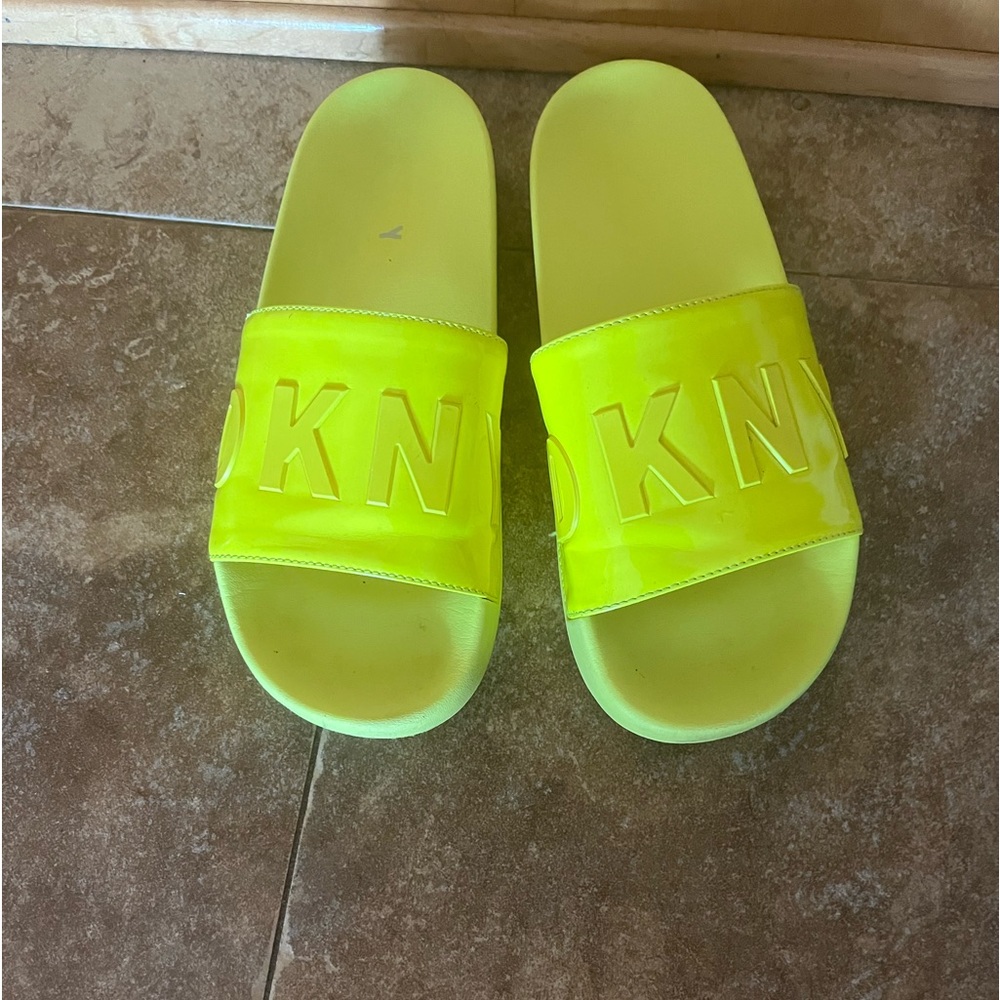 DKNY yellow flip flops